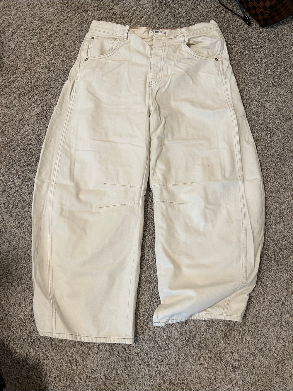 Free people jean… color looks like ecru